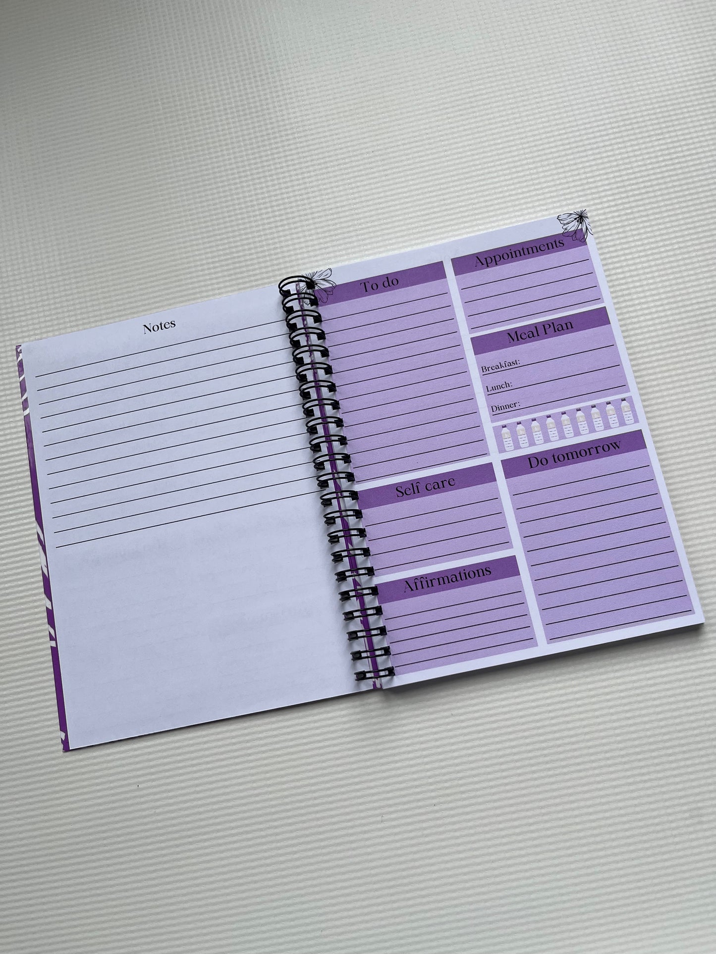 Purple floral daily planner