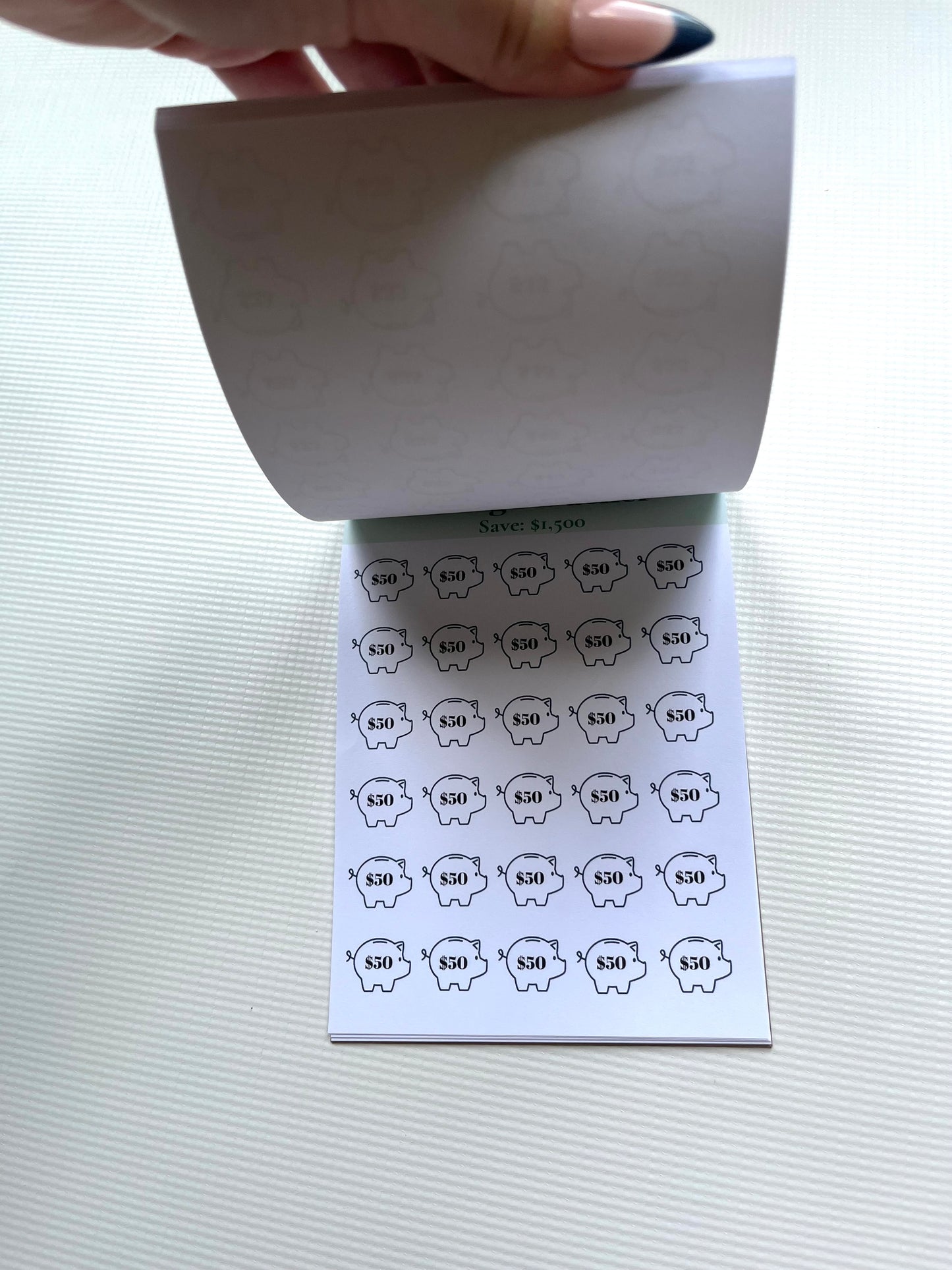 Savings tracker notepad