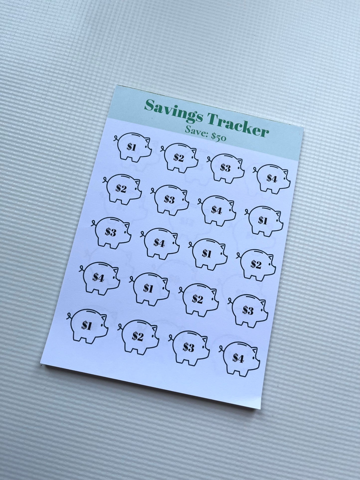 Savings tracker notepad