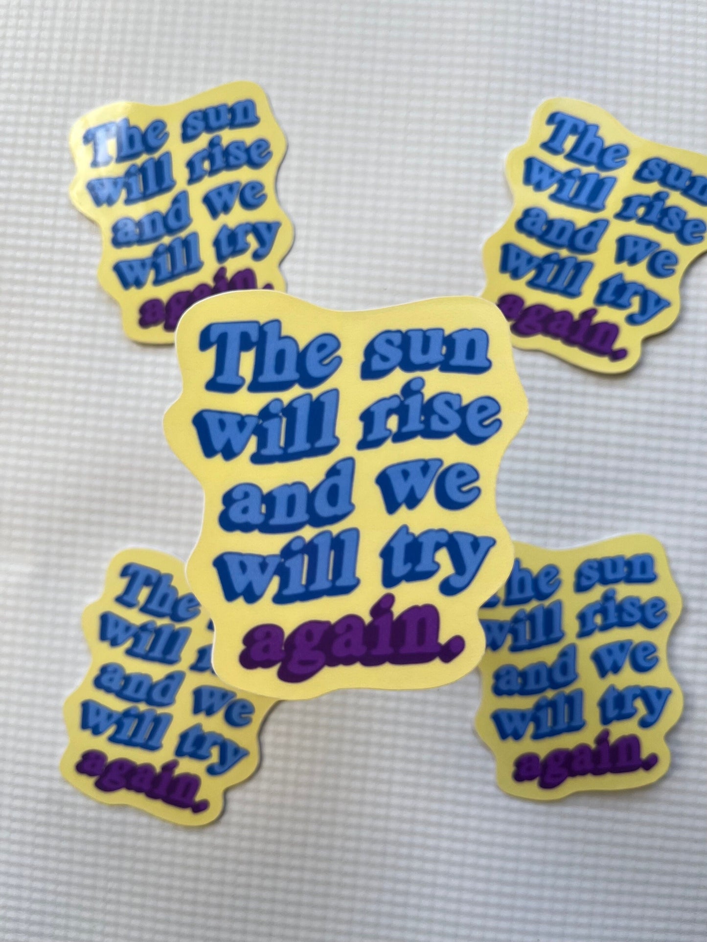 The sun will rise and we will try again sticker